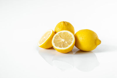 Close-up of fruits against white background