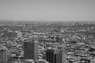 High angle view of buildings against clear sky