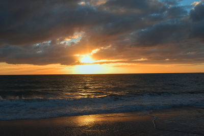 Scenic view of sea against sky during sunset