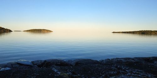 Scenic view of sea against clear sky