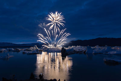 Firework display at night