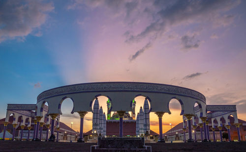 View of central java mosque against cloudy sky