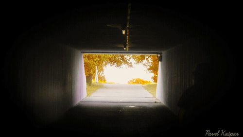 Narrow walkway along walls in tunnel