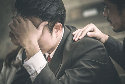 Close-up of people with hands