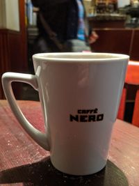 Close-up of coffee cup on table