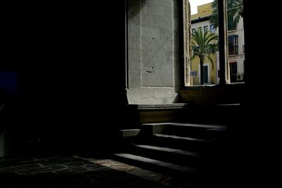 View of narrow building in the dark