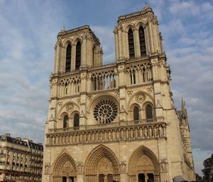 Low angle view of historic building against sky - notre-dame paris