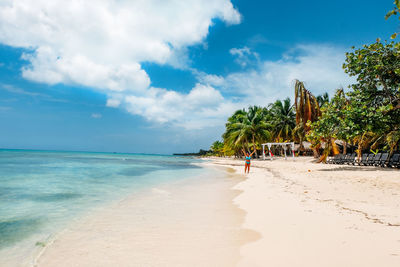 Scenic view of beach against sky