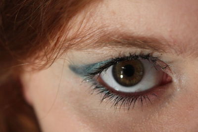 Cropped image of young woman with eye make-up