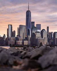 View of buildings in city during sunset
