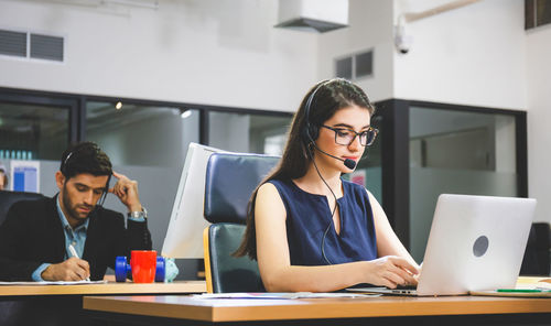 Man working on table in office