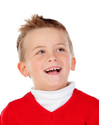 Portrait of happy boy against white background