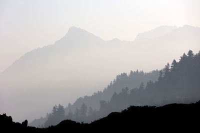 Silhouette of mount cheam with layers of smoky mountains in chilliwack, bc, canada