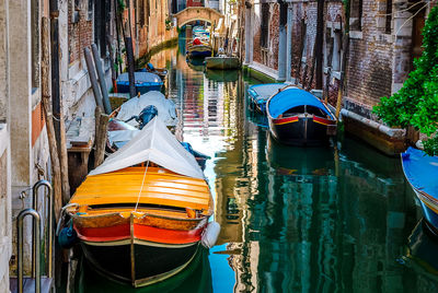 Boats moored in canal