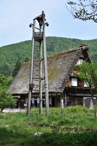 Old house on grassy field