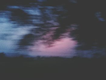 Scenic view of silhouette trees against sky at sunset