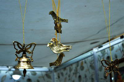 Low angle view of chandelier hanging on ceiling