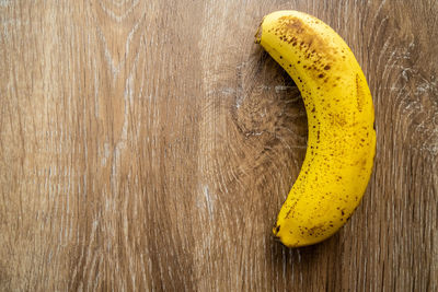 Directly above shot of yellow fruit on table