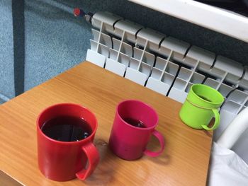 High angle view of coffee cup on table