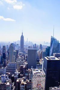 Modern buildings in city against sky