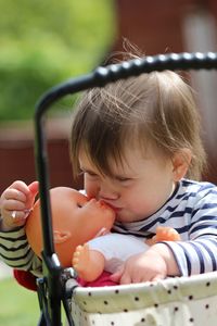 Close-up of girl playing outdoors