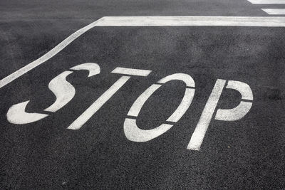 High angle view of stop sign on road