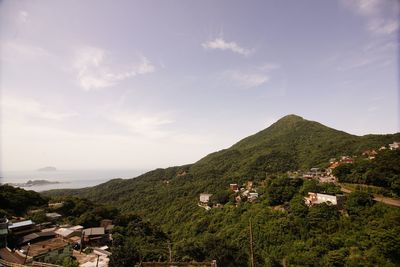 Scenic view of residential buildings against sky