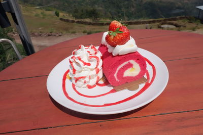 High angle view of cake in plate on table