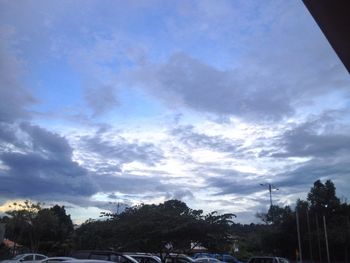 Low angle view of road against cloudy sky