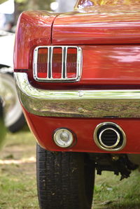 Close-up of red vintage car