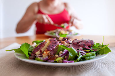 Close-up of salad in bowl on table
