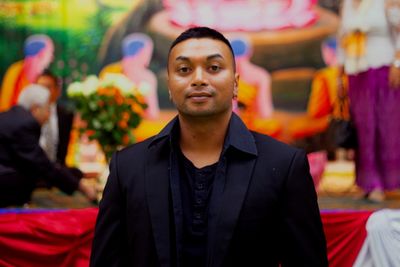 Portrait of man standing in ceremony