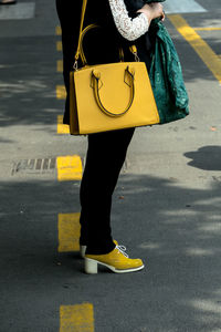 Close-up of woman standing in pond
