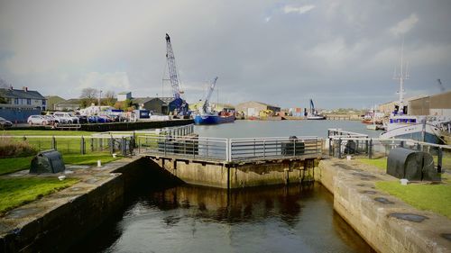 Boats moored in harbor