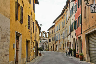 Narrow alley amidst buildings in city