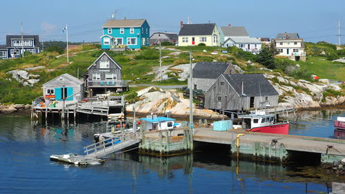 Boats moored at harbor