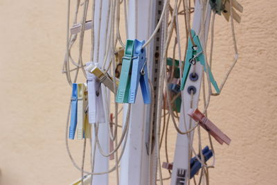 Close-up of pegs against the wall