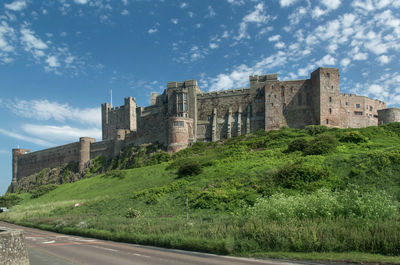 View of castle against cloudy sky