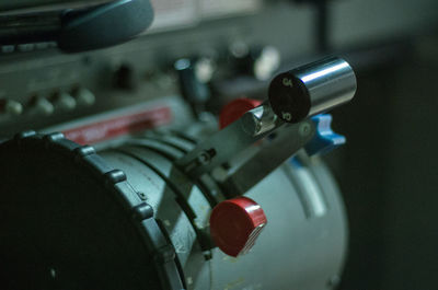 Close-up of lever on machine