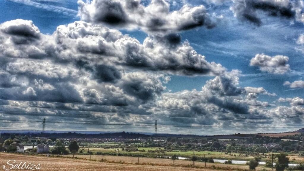 sky, cloud - sky, cloudy, landscape, cloud, electricity pylon, power line, tranquil scene, tranquility, field, weather, nature, electricity, scenics, overcast, connection, beauty in nature, fuel and power generation, cloudscape, day