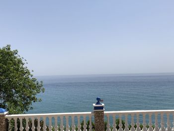 Scenic view of sea against clear sky