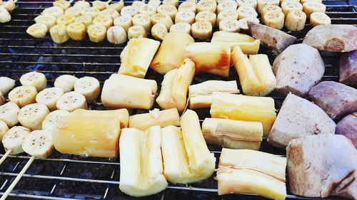 Sweet popato and banana roast on firewood klin., thai street food.