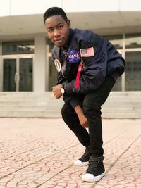 Portrait of young man standing outdoors