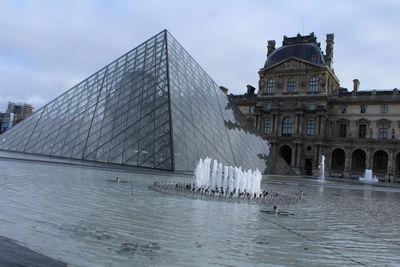 View of building against cloudy sky