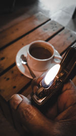 High angle view of coffee cup on table