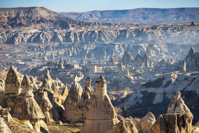 Panoramic view of landscape and snowcapped mountains