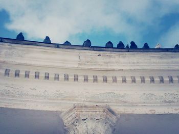 Built structure against cloudy sky