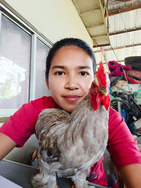 Portrait of smiling young woman