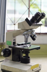 Close-up of microscope and equipment