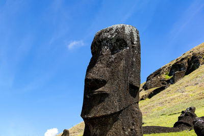 Low angle view of statue against sky